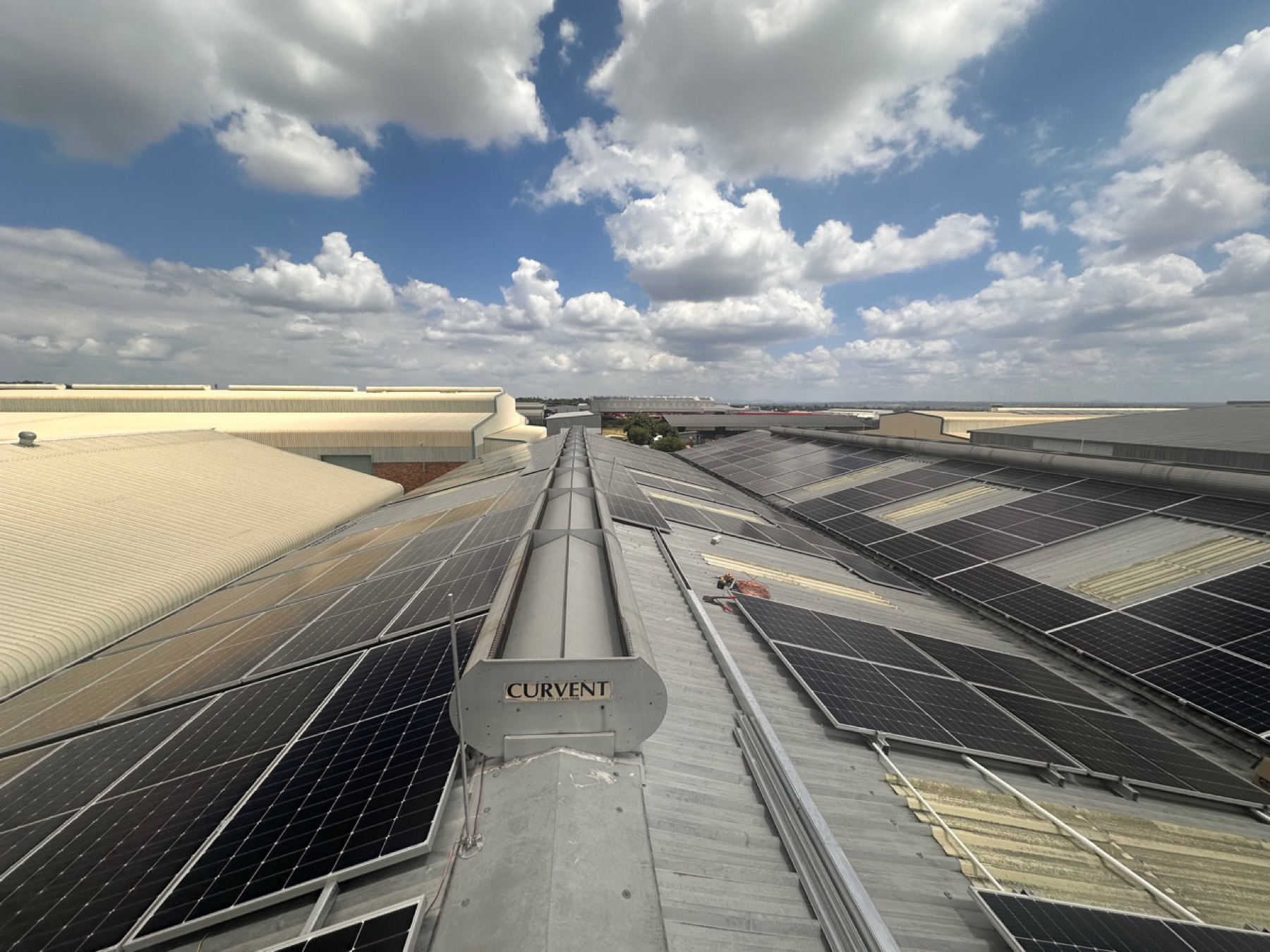 Large industrial rooftop solar array installed by Tri Energy Solutions